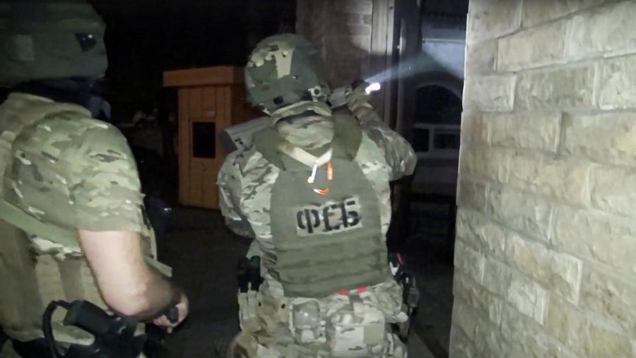 A view shows a shooting scene on the street of Makhachkala, Dagestan, in southern Russia, June 23, 2024, in this still image obtained from a video.  VIDEO OBTAINED BY REUTERS/via REUTERS  THIS IMAGE HAS BEEN SUPPLIED BY A THIRD PARTY. MANDATORY CREDIT. NO RESALES. NO ARCHIVES.