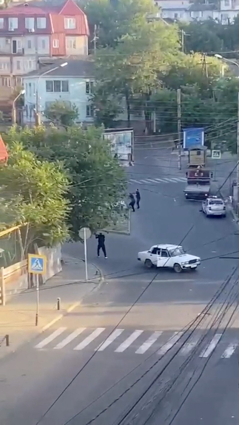 RUSSIA-SHOOTINGS/MAKHACHKALA A view shows a shooting scene on the street of Makhachkala, Dagestan, in southern Russia, June 23, 2024, in this still image obtained from a video. VIDEO OBTAINED BY REUTERS/via REUTERS THIS IMAGE HAS BEEN SUPPLIED BY A THIRD PARTY. MANDATORY CREDIT. NO RESALES. NO ARCHIVES.
