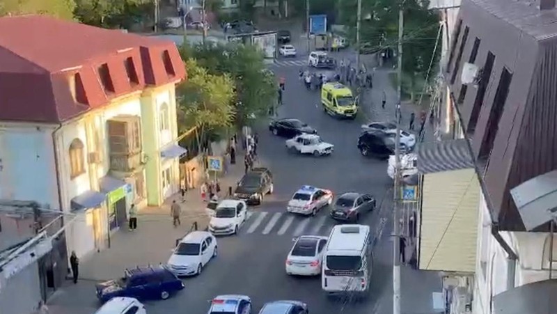 A view shows a shooting scene on the street of Makhachkala, Dagestan, in southern Russia, June 23, 2024, in this still image obtained from a video.  VIDEO OBTAINED BY REUTERS/via REUTERS  THIS IMAGE HAS BEEN SUPPLIED BY A THIRD PARTY. MANDATORY CREDIT. NO RESALES. NO ARCHIVES.