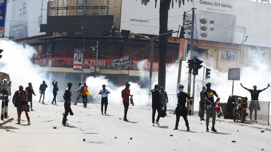 Demonstrators react as police use tear gas to disperse protesters during a demonstration against Kenya's proposed finance bill 2024/2025 in Nairobi, Kenya, June 25, 2024. REUTERS/Monicah Mwangi