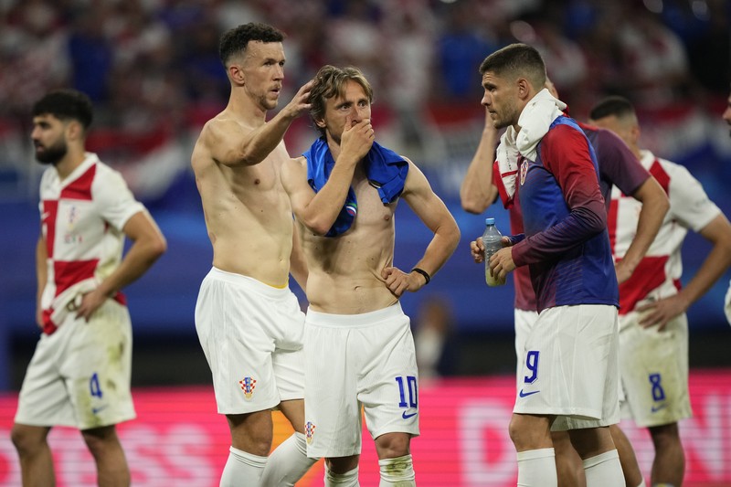 Reaksi Luka Modric dari Kroasia usai laga Grup B antara Kroasia melawan Italia pada turnamen sepak bola Euro 2024 di Leipzig, Jerman, Senin, 24 Juni 2024. Reaksi Luka Modric dari Kroasia usai laga Grup B antara Kroasia melawan Italia pada turnamen sepak bola Euro 2024 di Leipzig, Jerman, Senin, 24 Juni 2024. (AP Photo/Sunday Alamba)