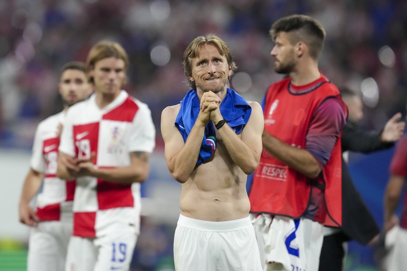 Reaksi Luka Modric dari Kroasia usai laga Grup B antara Kroasia melawan Italia pada turnamen sepak bola Euro 2024 di Leipzig, Jerman, Senin, 24 Juni 2024. Reaksi Luka Modric dari Kroasia usai laga Grup B antara Kroasia melawan Italia pada turnamen sepak bola Euro 2024 di Leipzig, Jerman, Senin, 24 Juni 2024. (AP Photo/Sunday Alamba)