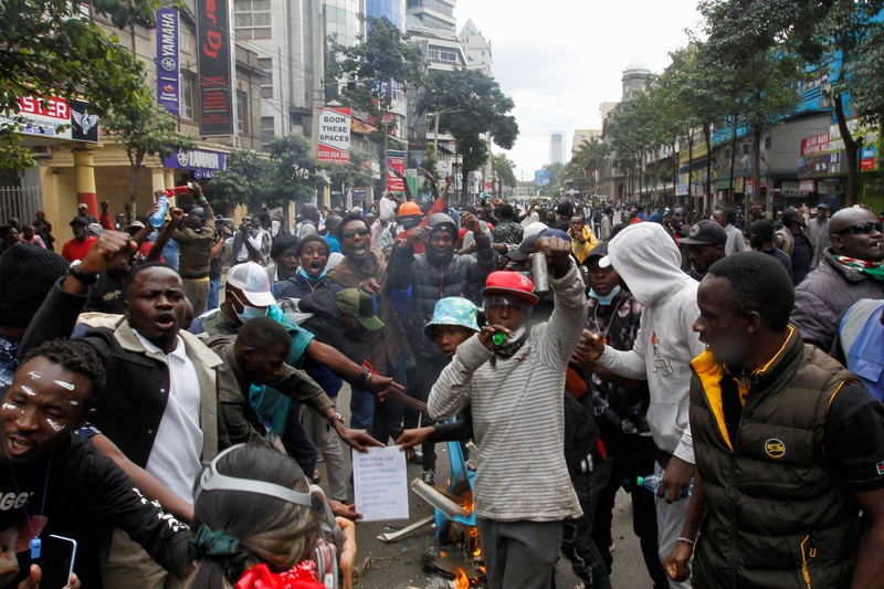 KENYA-BUDGET/ People take part in a demonstration over police killings of people protesting against Kenya's proposed finance bill 2024/2025, in Nairobi, Kenya, June 27, 2024. REUTERS/Monicah Mwangi