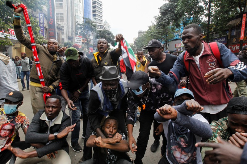KENYA-BUDGET/ People take part in a demonstration over police killings of people protesting against Kenya's proposed finance bill 2024/2025, in Nairobi, Kenya, June 27, 2024. REUTERS/Monicah Mwangi