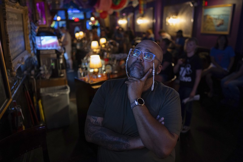 Orang-orang menghadiri pesta debat presiden AS pertama yang diselenggarakan oleh CNN di Atlanta, di Union Pub di Capitol Hill di Washington, AS, 27 Juni 2024. Orang-orang menghadiri pesta debat presiden AS pertama yang diselenggarakan oleh CNN di Atlanta, di Union Pub di Capitol Hill di Washington, AS, 27 Juni 2024. (REUTERS/Nathan Howard)