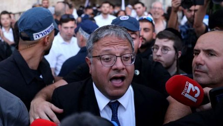 Israel's National Security Minister Itamar Ben-Gvir joins Jewish nationalists, including far-right activists, rallying at Jerusalem's Damascus Gate on June 5, 2024 during the so-called Jerusalem Day flag march, that commemorates the Israeli army's capture in the 1967 Arab-Israeli war of the city's eastern sector, home to the Al-Aqsa mosque compound, Islam's third holiest site, which Jews call the Temple Mount. (Photo by Menahem KAHANA / AFP)