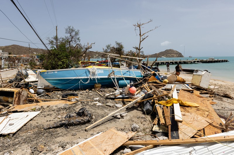 Puing-puing yang berserakan dan rumah-rumah yang atapnya hilang terlihat dalam foto drone setelah Badai Beryl melewati pulau Petite Martinique, Grenada 2 Juli 2024. Puing-puing yang berserakan dan rumah-rumah yang atapnya hilang terlihat dalam foto drone setelah Badai Beryl melewati pulau Petite Martinique, Grenada 2 Juli 2024. (REUTERS/Arthur Daniel)