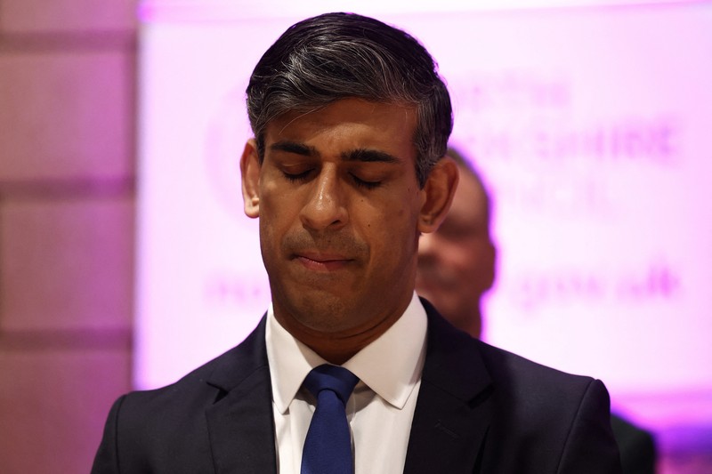 Reaksi Perdana Menteri Inggris dan pemimpin Partai Konservatif Rishi Sunak saat dia menunggu deklarasi hasil untuk Richmond dan Northallerton di Northallerton, utara Inggris, pada awal 5 Juli 2024. Reaksi Perdana Menteri Inggris dan pemimpin Partai Konservatif Rishi Sunak saat dia menunggu deklarasi hasil untuk Richmond dan Northallerton di Northallerton, utara Inggris, pada awal 5 Juli 2024. (DARREN STAPLES/Pool via REUTERS)