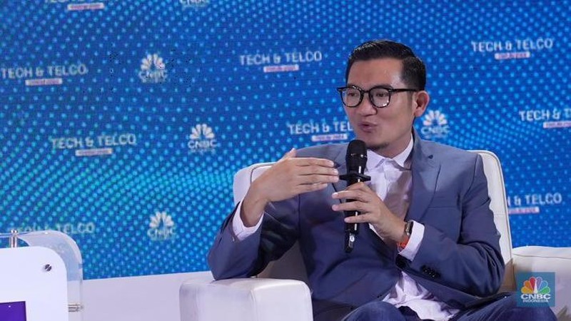Dirjen Penyelengaraan Pos dan Informatika Kominfo, Wayan Toni Supriyanto saat mewakili Menteri Komunikasi & Informatika RI, Budi Arie Setiadi sebagai pembicara utama dalam Tech & Telco Forum 2024 di Menara Bank Mega, Jakarta, Jumat (5/7/2024). (CNBC Indonesia/Muhammad Sabki)