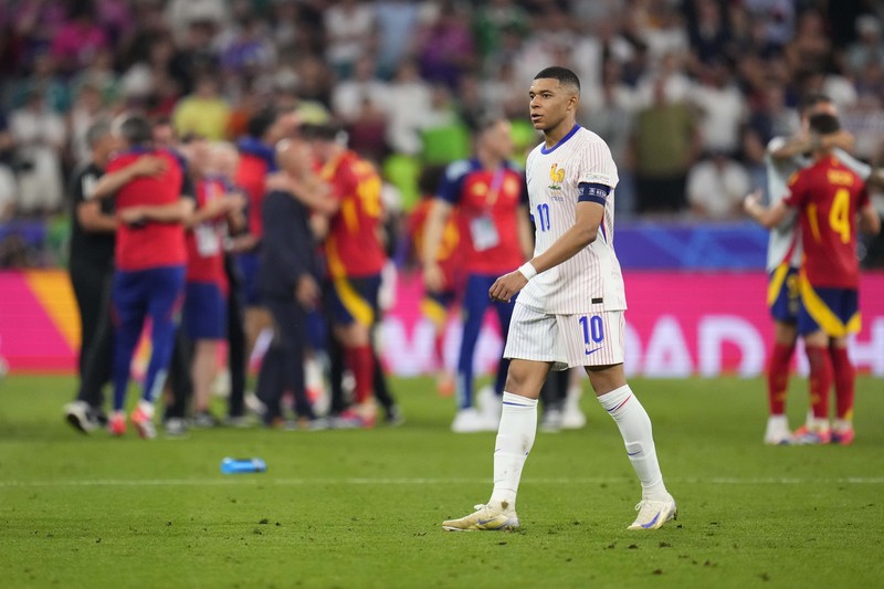 Para pemain Spanyol melakukan selebrasi usai laga semifinal Spanyol kontra Prancis pada turnamen sepak bola Euro 2024 di Munich, Jerman, Selasa, 9 Juli 2024. Spanyol menang 2-1. Para pemain Spanyol melakukan selebrasi usai laga semifinal Spanyol kontra Prancis pada turnamen sepak bola Euro 2024 di Munich, Jerman, Selasa, 9 Juli 2024. Spanyol menang 2-1. (AP Photo/Matthias Schrader)