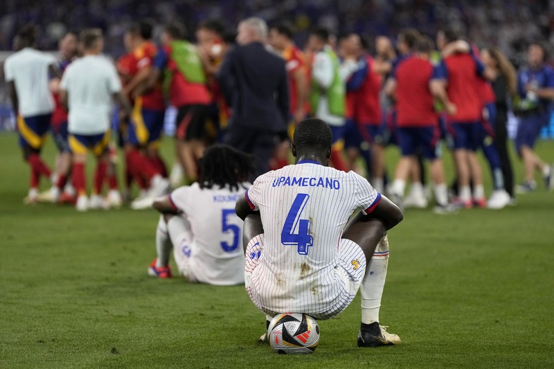 Para pemain Spanyol melakukan selebrasi usai laga semifinal Spanyol kontra Prancis pada turnamen sepak bola Euro 2024 di Munich, Jerman, Selasa, 9 Juli 2024. Spanyol menang 2-1. Para pemain Spanyol melakukan selebrasi usai laga semifinal Spanyol kontra Prancis pada turnamen sepak bola Euro 2024 di Munich, Jerman, Selasa, 9 Juli 2024. Spanyol menang 2-1. (AP Photo/Matthias Schrader)