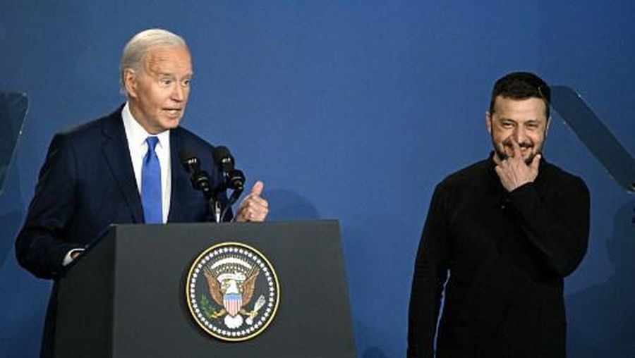 US President Joe Biden corrects himself after accidentally introducing  Ukraine's President Volodymyr Zelensky (R) as Russia's President Vladimir Putin during the Ukraine Compact initiative on the sidelines of the NATO Summit at the Walter E. Washington Convention Center in Washington, DC, on July 11, 2024. (Photo by Brendan SMIALOWSKI / AFP)