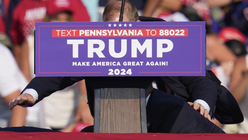 People gather for a campaign rally of Republican presidential candidate and former U.S. President Donald Trump at the Butler Farm Show in Butler, Pennsylvania, U.S., July 13, 2024. REUTERS/Brendan McDermid