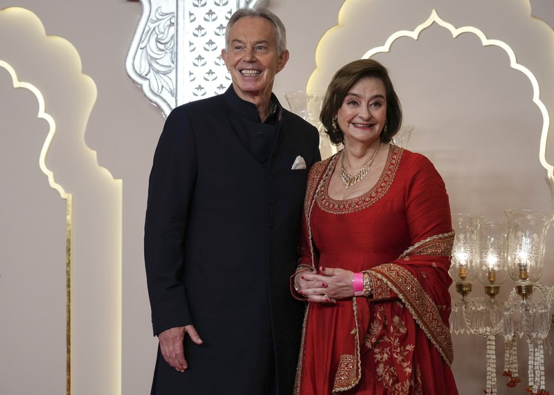 India Ambani Wedding American actor and professional wrestler John Cena gestures as he arrives at the wedding of billionaire Mukesh Ambani's son Anant Ambani and Radhika Merchant at Jio World Convention Centre in Mumbai, India, Friday, July 12, 2024. (AP Photo /Rajanish Kakade)
