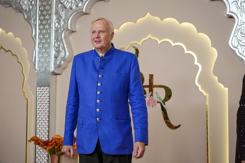 India Ambani Wedding American actor and professional wrestler John Cena gestures as he arrives at the wedding of billionaire Mukesh Ambani's son Anant Ambani and Radhika Merchant at Jio World Convention Centre in Mumbai, India, Friday, July 12, 2024. (AP Photo /Rajanish Kakade)