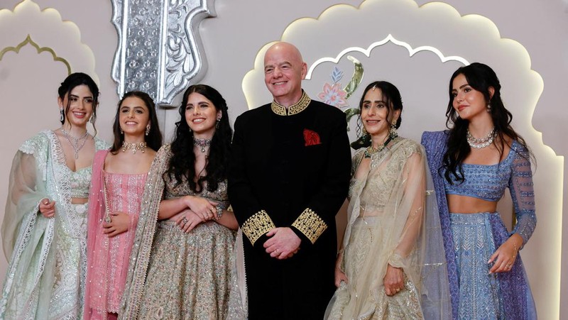 American actor and professional wrestler John Cena gestures as he arrives at the wedding of billionaire Mukesh Ambani's son Anant Ambani and Radhika Merchant at Jio World Convention Centre in Mumbai, India, Friday, July 12, 2024. (AP Photo /Rajanish Kakade)