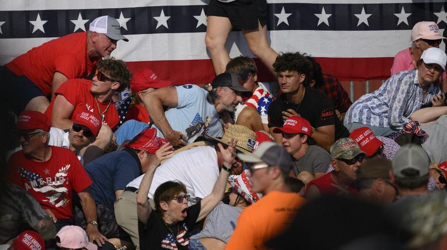 People gather for a campaign rally of Republican presidential candidate and former U.S. President Donald Trump at the Butler Farm Show in Butler, Pennsylvania, U.S., July 13, 2024. REUTERS/Brendan McDermid