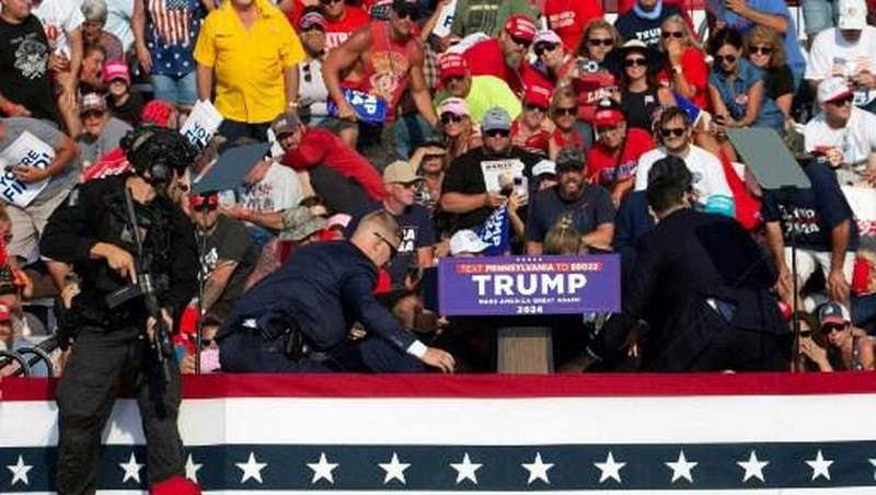 People gather for a campaign rally of Republican presidential candidate and former U.S. President Donald Trump at the Butler Farm Show in Butler, Pennsylvania, U.S., July 13, 2024. REUTERS/Brendan McDermid