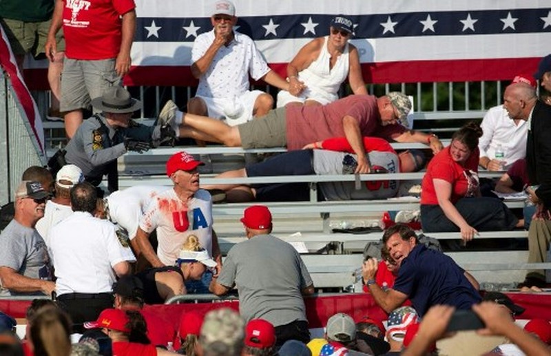 USA-ELECTION/TRUMP People gather for a campaign rally of Republican presidential candidate and former U.S. President Donald Trump at the Butler Farm Show in Butler, Pennsylvania, U.S., July 13, 2024. REUTERS/Brendan McDermid