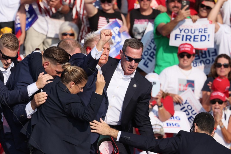 USA-ELECTION/TRUMP People gather for a campaign rally of Republican presidential candidate and former U.S. President Donald Trump at the Butler Farm Show in Butler, Pennsylvania, U.S., July 13, 2024. REUTERS/Brendan McDermid