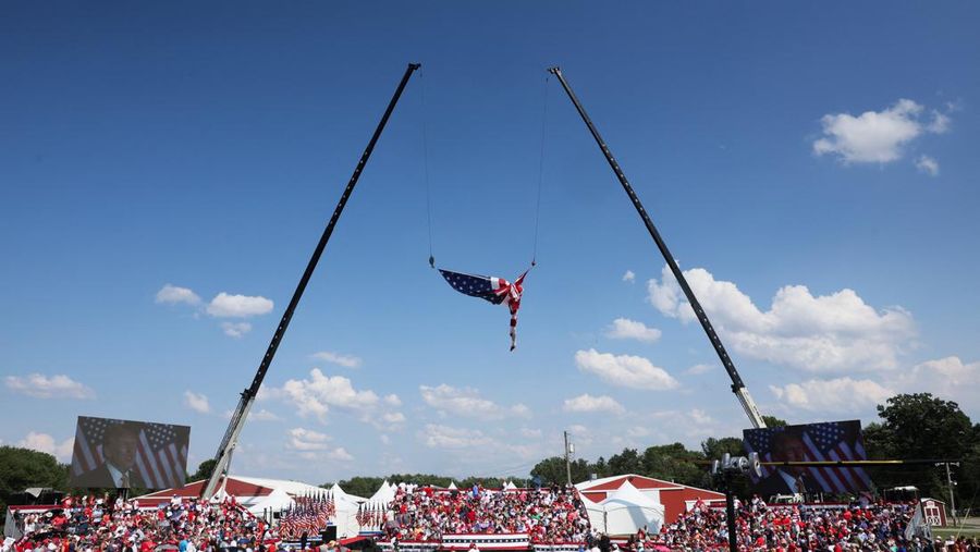 People gather for a campaign rally of Republican presidential candidate and former U.S. President Donald Trump at the Butler Farm Show in Butler, Pennsylvania, U.S., July 13, 2024. REUTERS/Brendan McDermid
