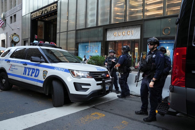 USA-ELECTION/TRUMP A member of security forces stands guard outside Trump Tower after Trump was injured when shots were fired during a campaign rally held in Butler, in New York, U.S., July 13, 2024. REUTERS/David Dee Delgado