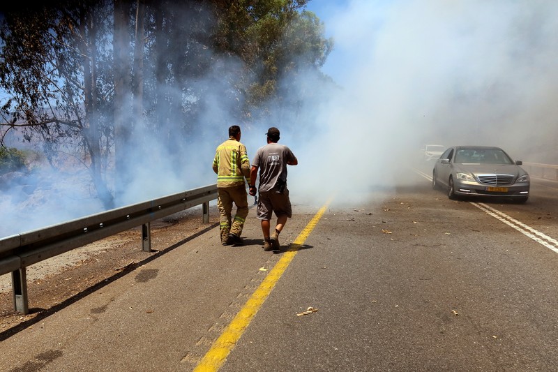 Asap mengepul menyusul serangan Israel di desa Kfar Kila di Lebanon selatan pada 16 Juli 2024, di tengah berlanjutnya ketegangan di perbatasan Lebanon-Israel. (AFP/RABIH DAHER) Asap mengepul menyusul serangan Israel di desa Kfar Kila di Lebanon selatan pada 16 Juli 2024, di tengah berlanjutnya ketegangan di perbatasan Lebanon-Israel. (AFP/RABIH DAHER)