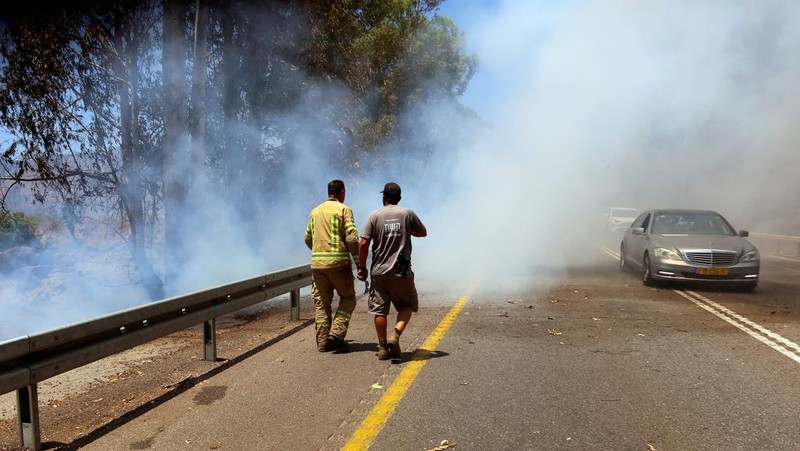 Asap mengepul menyusul serangan Israel di desa Kfar Kila di Lebanon selatan pada 16 Juli 2024, di tengah berlanjutnya ketegangan di perbatasan Lebanon-Israel. (AFP/RABIH DAHER)