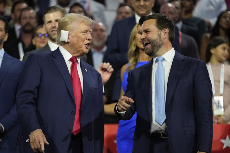 Kandidat presiden dari Partai Republik mantan Presiden Donald Trump tampil bersama calon wakil presiden JD Vance, R-Ohio, pada Konvensi Nasional Partai Republik Senin, 15 Juli 2024, di Milwaukee. Kandidat presiden dari Partai Republik mantan Presiden Donald Trump tampil bersama calon wakil presiden JD Vance, R-Ohio, pada Konvensi Nasional Partai Republik Senin, 15 Juli 2024, di Milwaukee. (AP Photo/Paul Sancya)
