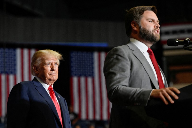 Kandidat presiden dari Partai Republik mantan Presiden Donald Trump tampil bersama calon wakil presiden JD Vance, R-Ohio, pada Konvensi Nasional Partai Republik Senin, 15 Juli 2024, di Milwaukee. Kandidat presiden dari Partai Republik mantan Presiden Donald Trump tampil bersama calon wakil presiden JD Vance, R-Ohio, pada Konvensi Nasional Partai Republik Senin, 15 Juli 2024, di Milwaukee. (AP Photo/Paul Sancya)