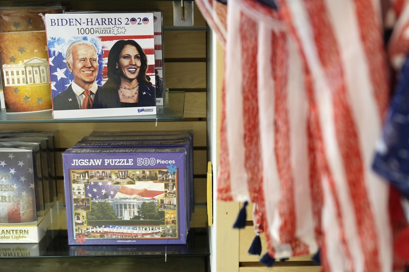 Election 2024 Harris A television broadcasts the news that Vice President Kamala Harris was endorsed by President Joe Biden after he dropped out of the 2024 race for the White House, Sunday, July 21, 2024., in Paris.