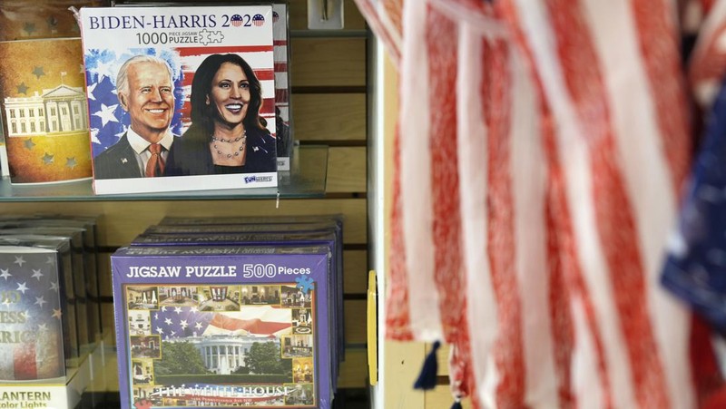 A television broadcasts the news that Vice President Kamala Harris was endorsed by President Joe Biden after he dropped out of the 2024 race for the White House, Sunday, July 21, 2024., in Paris.