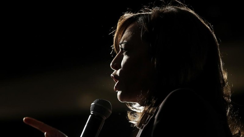 A television broadcasts the news that Vice President Kamala Harris was endorsed by President Joe Biden after he dropped out of the 2024 race for the White House, Sunday, July 21, 2024., in Paris.