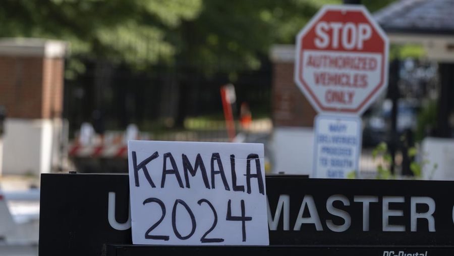 A television broadcasts the news that Vice President Kamala Harris was endorsed by President Joe Biden after he dropped out of the 2024 race for the White House, Sunday, July 21, 2024., in Paris.