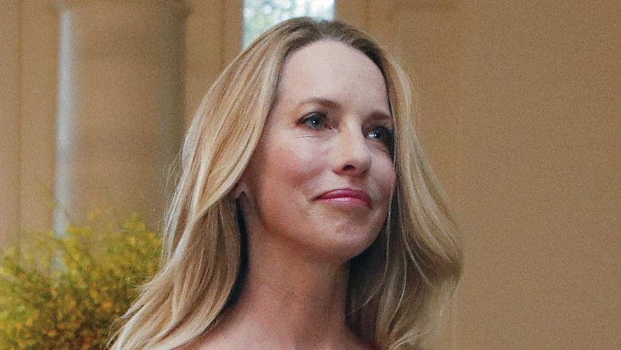 FILE - In this Aug. 2, 2016, file photo, Laurene Powell Jobs arrives for a State Dinner at the White House in Washington. Philanthropist Laurene Powell Jobs is gearing up to invest $3.5 billion into climate-focused initiatives in the next ten years. But if the donation patterns of her foundation continue, the public might never know where that money is going. (AP Photo/Pablo Martinez Monsivais, File)