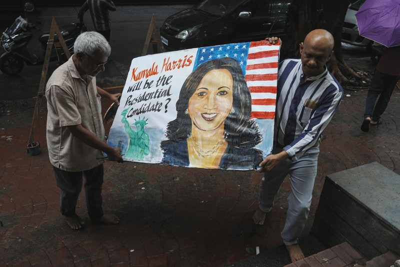 India Election 2024 Biden Drops Out Indian art teacher Prithvi Raj Kambli, makes painting of US. Vice President Kamala Harris, in Mumbai, India, Monday, July 22, 2024. (AP Photo/Rafiq Maqbool)