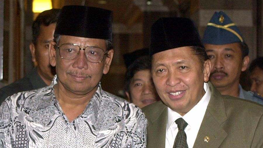 Indonesia's Vice President Hamzah Haz gestures as he speaks at a seminar in Jakarta, Indonesia, Wednesday, Dec. 18, 2002. Haz, a hard-line Islamic politician who has previously defended radicals and denied that Indonesia had a terrorism problem, on Tuesday downplayed his past differences with President Megawati Sukarnoputri saying that Indonesia's government is now united in fighting terrorism. (AP Photo/Muchtar Zakaria)