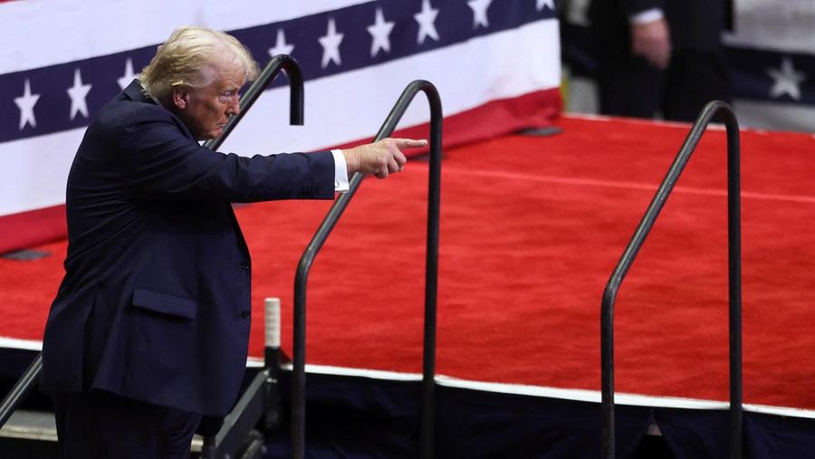 Republican presidential nominee and former U.S. President Donald Trump points, as he holds a campaign rally for the first time with his running mate, Republican vice presidential nominee U.S. Senator J.D. Vance (R-OH) in Grand Rapids, Michigan, U.S. July 20, 2024. REUTERS/Tom Brenner