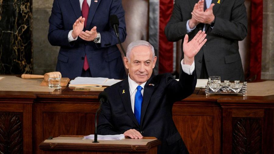 U.S. House Speaker Mike Johnson (R-LA) and Senate Foreign Relations Chair, Senator Ben Cardin (D-MD), applaud as Israeli Prime Minister Benjamin Netanyahu addresses a joint meeting of Congress at the U.S. Capitol in Washington, U.S., July 24, 2024. REUTERS/Craig Hudson