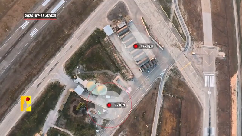 Kelompok bersenjata Lebanon Hizbullah telah menyiarkan video drone yang dikatakan menunjukkan fasilitas pertahanan udara, pesawat, dan unit penyimpanan bahan bakar di pangkalan udara Ramat David Israel. Kelompok bersenjata Lebanon Hizbullah telah menyiarkan video drone yang dikatakan menunjukkan fasilitas pertahanan udara, pesawat, dan unit penyimpanan bahan bakar di pangkalan udara Ramat David Israel. (X @alihashem_tv)