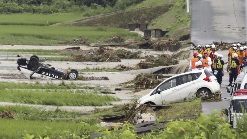 An aerial view shows a submerged residential area along Mogami river due to heavy rain in Tozawa Town, Yamagata Prefecture, northern Japan July 26, 2024, in this photo taken by Kyodo. Mandatory credit Kyodo/via REUTERS   ATTENTION EDITORS - THIS IMAGE HAS BEEN SUPPLIED BY A THIRD PARTY. MANDATORY CREDIT. JAPAN OUT. NO COMMERCIAL OR EDITORIAL SALES IN JAPAN.