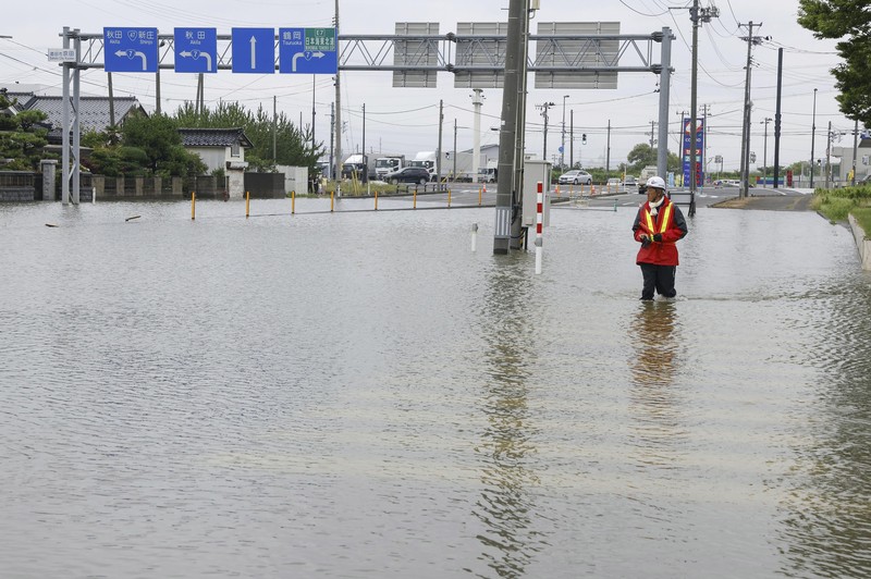 ASIA-WEATHER/JAPAN An aerial view shows a submerged residential area along Mogami river due to heavy rain in Tozawa Town, Yamagata Prefecture, northern Japan July 26, 2024, in this photo taken by Kyodo. Mandatory credit Kyodo/via REUTERS ATTENTION EDITORS - THIS IMAGE HAS BEEN SUPPLIED BY A THIRD PARTY. MANDATORY CREDIT. JAPAN OUT. NO COMMERCIAL OR EDITORIAL SALES IN JAPAN.