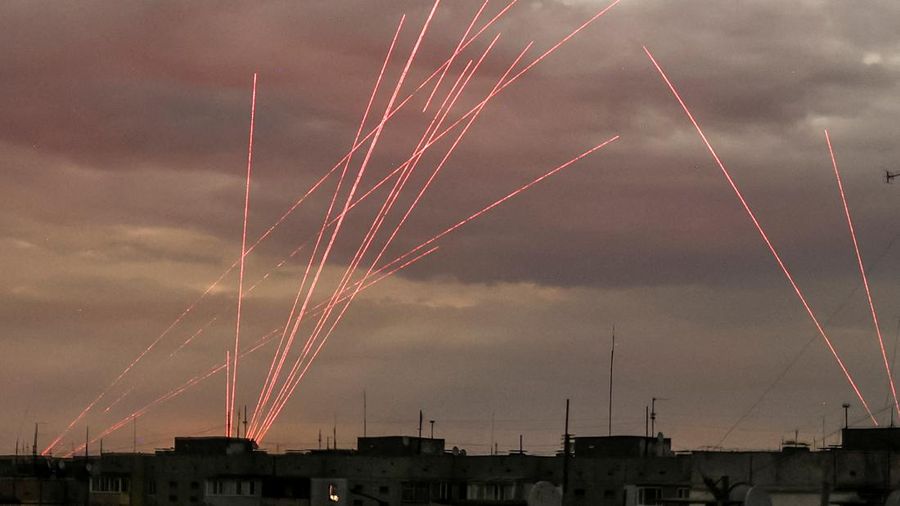 Paths of bullets are seen during a Russian drone strike, amid Russia's attack on Ukraine, in Kherson, Ukraine July 26, 2024. REUTERS/Stringer
