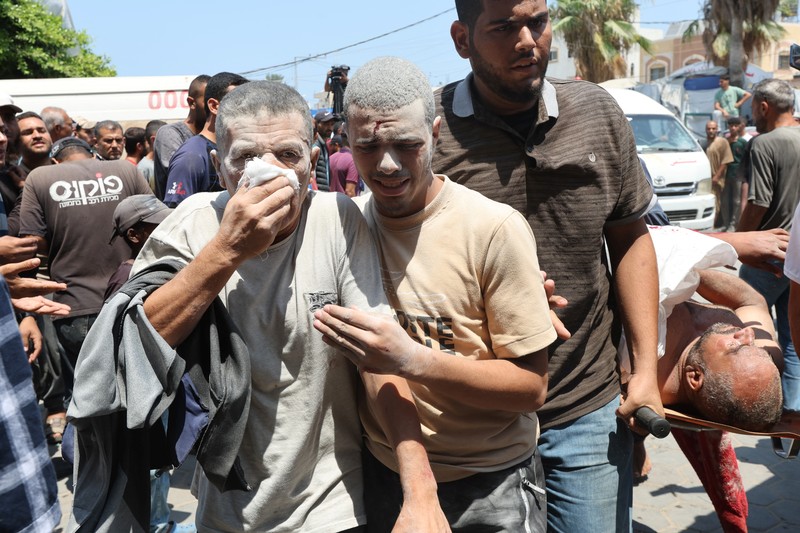 Suasana sekolah yang menjadi tempat penampungan pengungsi pasca serangan Israel di Deir Al-Balah, Jalur Gaza, Sabtu, (27/7/2024). (REUTERS/Ramadan Abed)