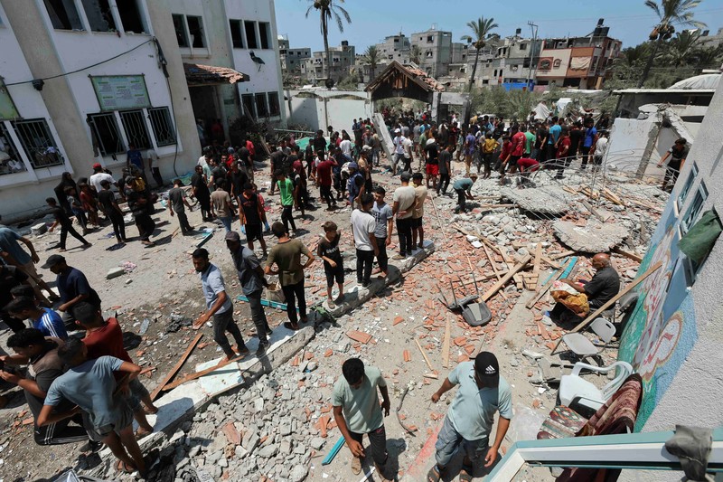 Suasana sekolah yang menjadi tempat penampungan pengungsi pasca serangan Israel di Deir Al-Balah, Jalur Gaza, Sabtu, (27/7/2024). (REUTERS/Ramadan Abed) Suasana sekolah yang menjadi tempat penampungan pengungsi pasca serangan Israel di Deir Al-Balah, Jalur Gaza, Sabtu, (27/7/2024). (REUTERS/Ramadan Abed)