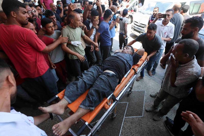 Suasana sekolah yang menjadi tempat penampungan pengungsi pasca serangan Israel di Deir Al-Balah, Jalur Gaza, Sabtu, (27/7/2024). (REUTERS/Ramadan Abed) Suasana sekolah yang menjadi tempat penampungan pengungsi pasca serangan Israel di Deir Al-Balah, Jalur Gaza, Sabtu, (27/7/2024). (REUTERS/Ramadan Abed)