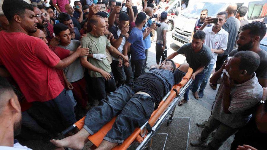 Suasana sekolah yang menjadi tempat penampungan pengungsi pasca serangan Israel di Deir Al-Balah, Jalur Gaza, Sabtu, (27/7/2024). (REUTERS/Ramadan Abed)
