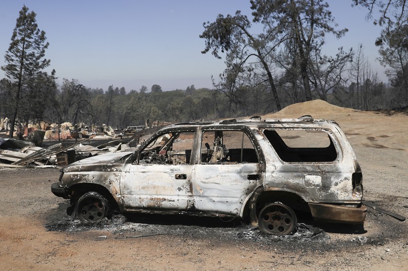 Kendaraan yang terbakar akibat Kebakaran Park Fire berjejer di halaman komunitas Cohasset di Butte County, California, Amerika Serikat (AS). (AP Photo/Noah Berger) Kendaraan yang terbakar akibat Kebakaran Park Fire berjejer di halaman komunitas Cohasset di Butte County, California, Amerika Serikat (AS). (AP Photo/Noah Berger)