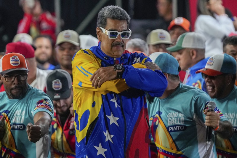 Para pengunjuk rasa berdemonstrasi menentang hasil resmi pemilu yang menyatakan terpilihnya kembali Presiden Nicolas Maduro, sehari setelah pemungutan suara di Valencia, Venezuela, Senin, 29 Juli 2024. Para pengunjuk rasa berdemonstrasi menentang hasil resmi pemilu yang menyatakan terpilihnya kembali Presiden Nicolas Maduro, sehari setelah pemungutan suara di Valencia, Venezuela, Senin, 29 Juli 2024. (AP Photo/Jacinto Oliveros)