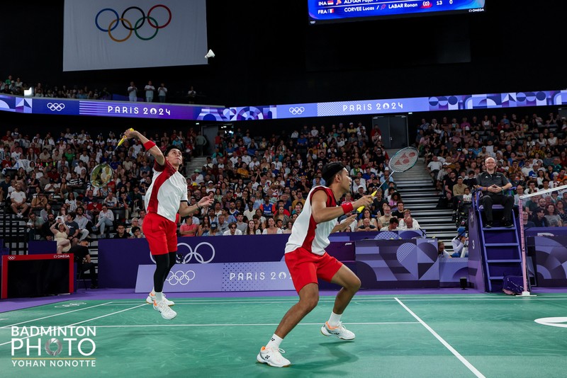 Fajar Alfian/Muhammad Rian Ardianto mengamankan tiket ke perempatfinal Olimpiade Paris 2024. Meski sempat terganggu oleh faktor teknis, Fajar/Rian tetap tenang dan fokus! Sebelum berlaga melawan wakil Prancis, Lucas Corvee/Ronan Labar pada Senin (29/7/2024). (Dok. PBSI)